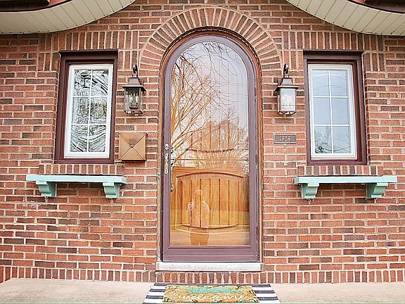 Custom arched entry doorway.