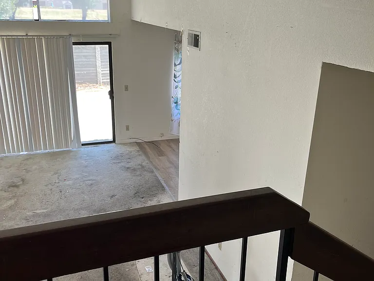 Living room with vaulted ceiling
