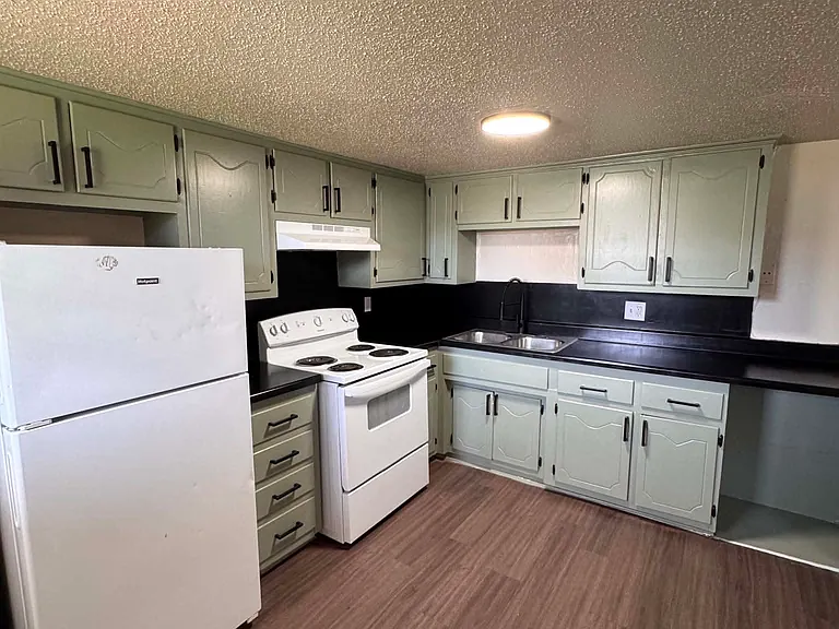 Lots of cabinet space in the kitchen of our two bedroom units!!
