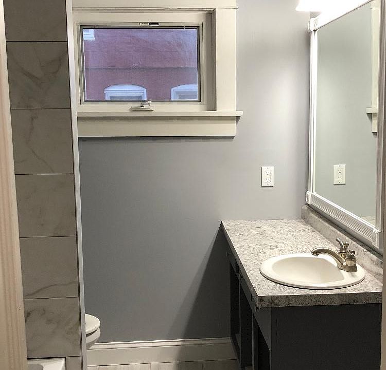 Updated BR, lights, countertop, custom tiled shower
