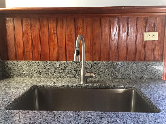 Kitchen sink and granite counter