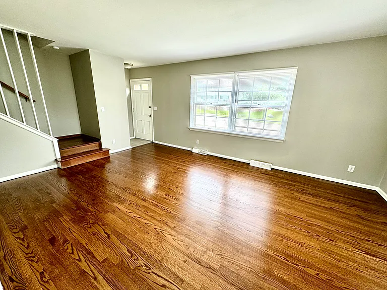 Large Sunny Living Room with Hardwood Floors