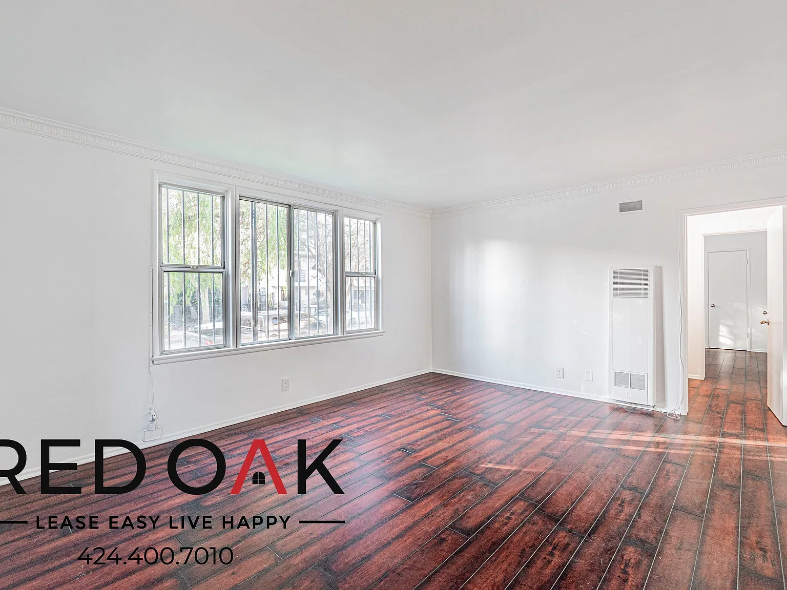Cozy 1-Bed with Hardwood-Style Floors, On-Site Laundry and Parking Available in the Heart of Kore... — Photo 3