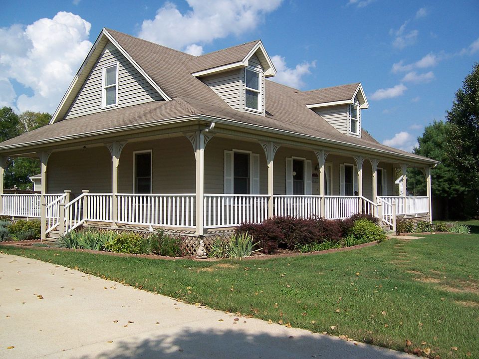 Gorgeous Cape Cod with Wrap Around Porch, huge deck off back with large yard!