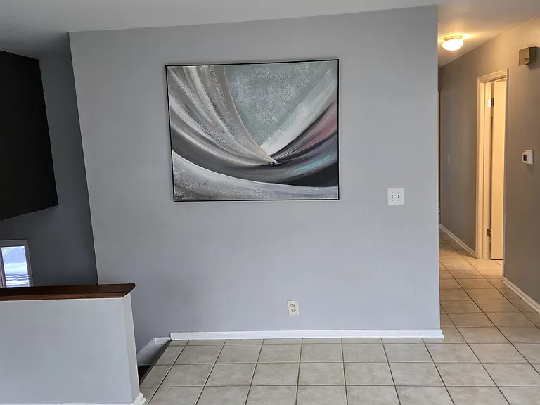 looking at landing from the entry, garage area