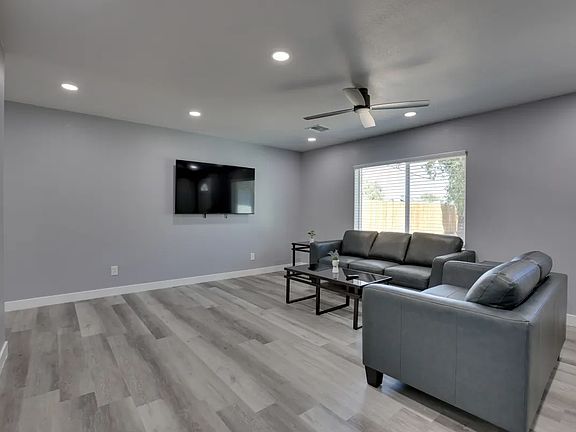 living room with installed tv mount
