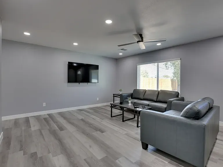 living room with installed tv mount