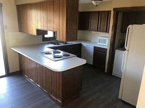 Eat in kitchen with walk out access to the deck and first floor laundry