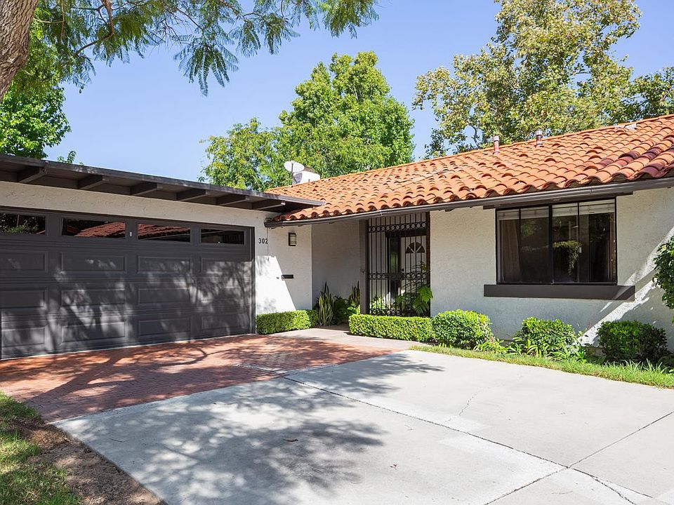 The exterior was recently painted. The extra-long driveway leads you into the 2 car garage.