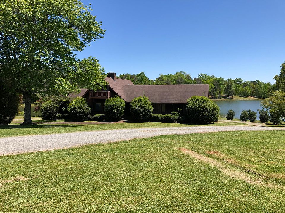 Lake Front Home with walk out basement and circular driveway