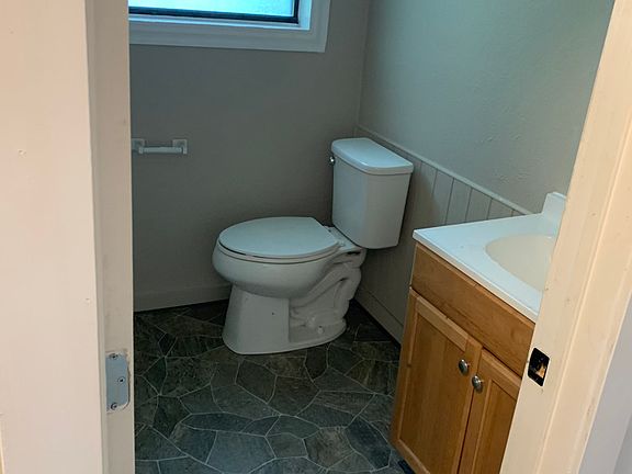 Bathroom with shower and closet
