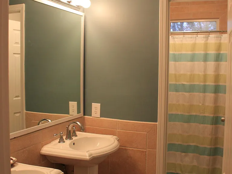 Full bath #2 with two sinks and tub/shower