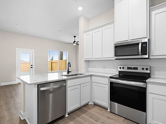 The kitchen has energy-efficient appliances.