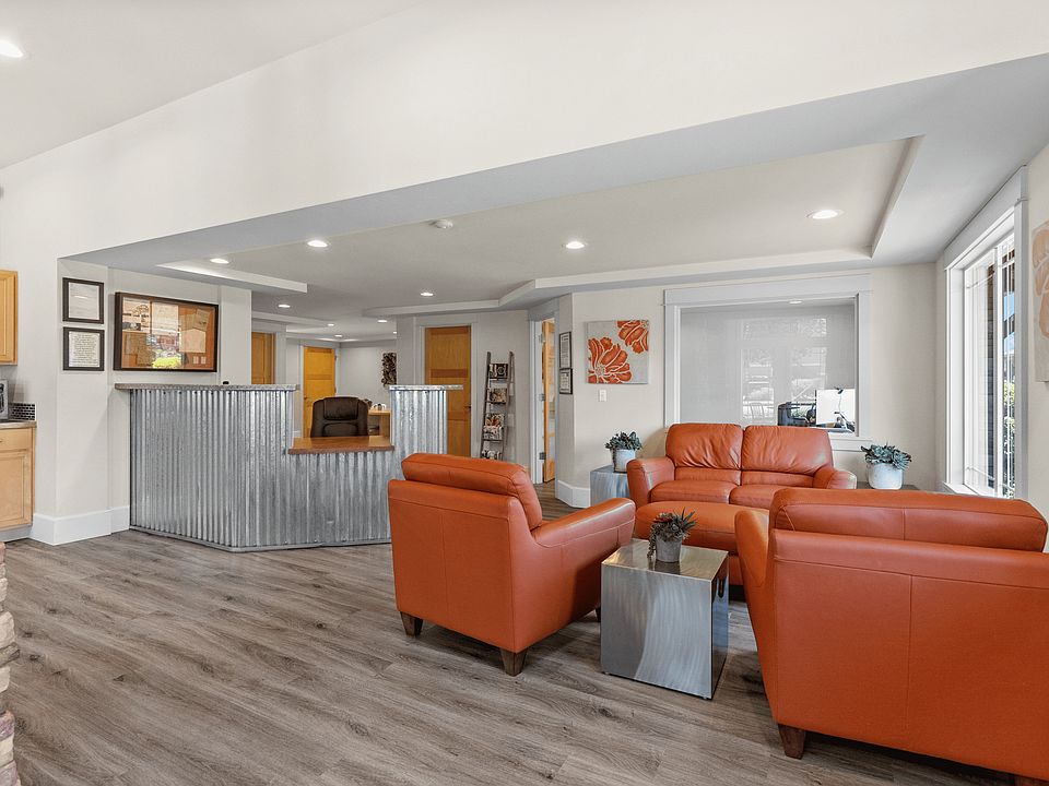 Welcoming leasing office with cozy lounge seating and friendly service.