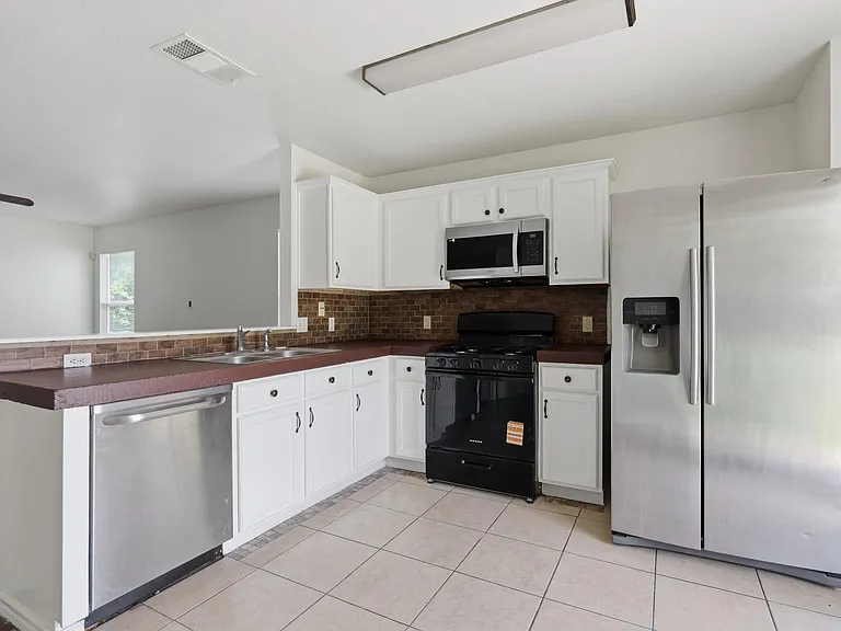 14910 Mossycup Ln — Photo 8