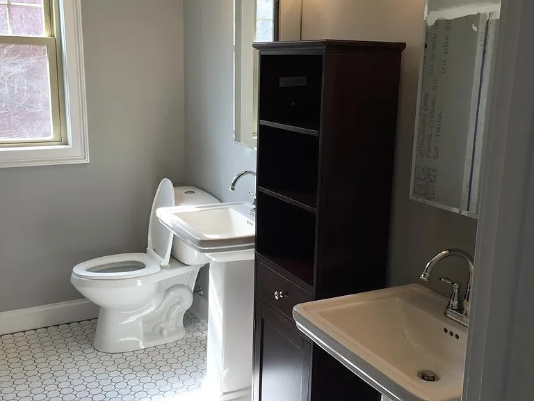Dual Vanities with Subway Tile Bath
