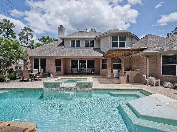 Just in time for Summer-stay cool under the covered back porch lanai or jump into this pool!