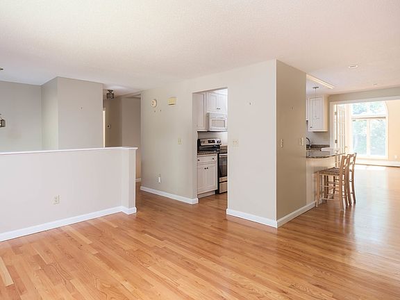living Rm and kitchen and french door to the great family room
