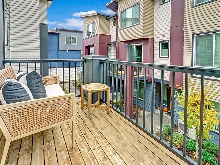 The dining area leads to your balcony with a grill provided for your outdoor BBQ.