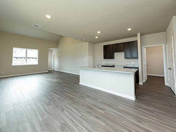 Dining Area to Kitchen and Family Room