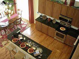 Hardwood floors and stainless steel appliances
