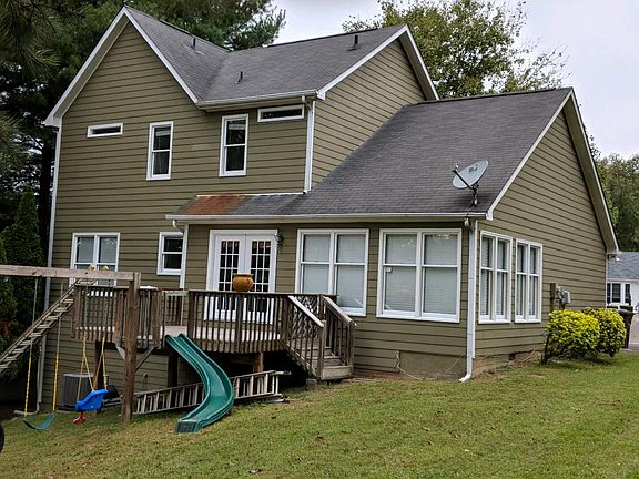 Rear view w/ deck and swing