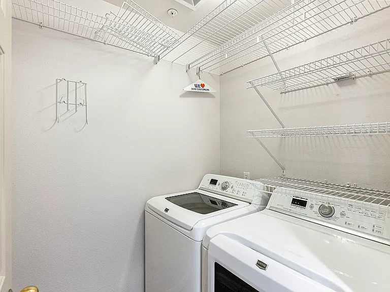 Newer washer-drier in upstairs laundry room