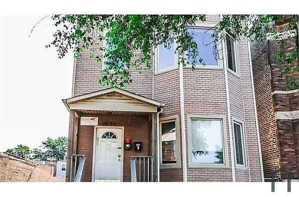 Building Photo - 7233 S Stony Island Ave #1