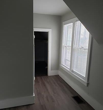 one of the walk in closets in one of the bed rooms