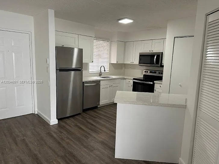 6175 NW 186th St #110 — Photo 11