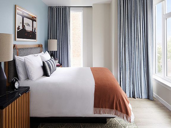 Designer-Furnished Apartment Suites with Comfy Beds and Luxury Linens