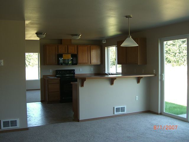 family room opens to kitchen