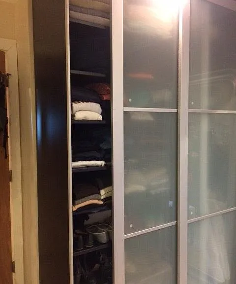 Spacious sliding-doors-furnished closet in Master Bedroom