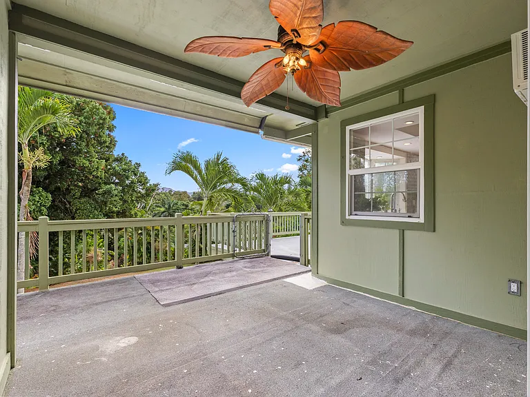 Primary bedroom featuring direct access to the outdoor deck