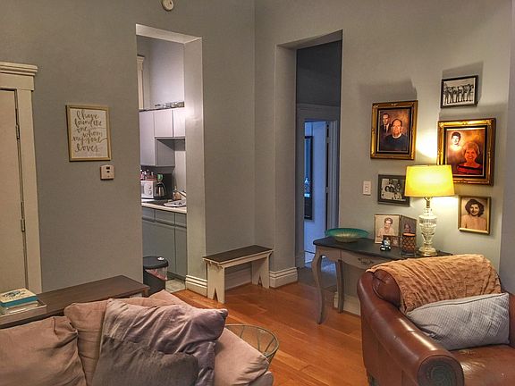 Living room with access to kitchen.