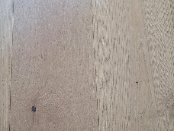 Hardwood flooring throughout, except for guest bathroom