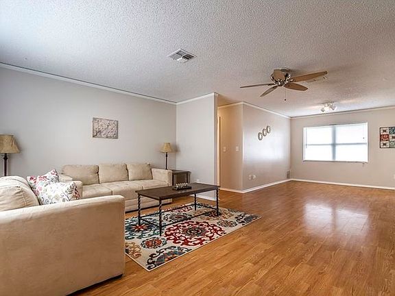 OFF THE LIVING ROOM IS THE DINING AREA