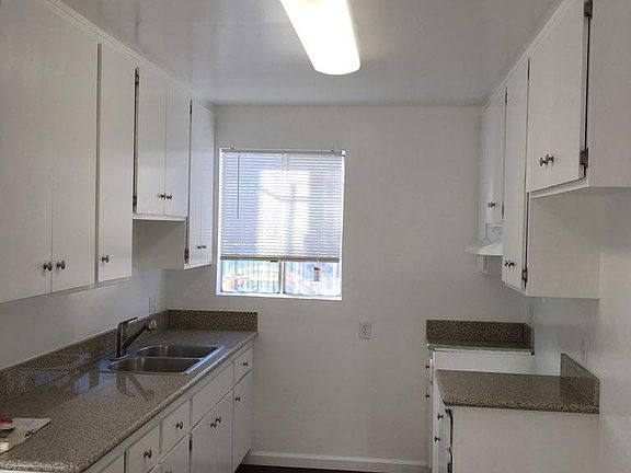 New Granite Counter tops, new stove, new floors, new sink