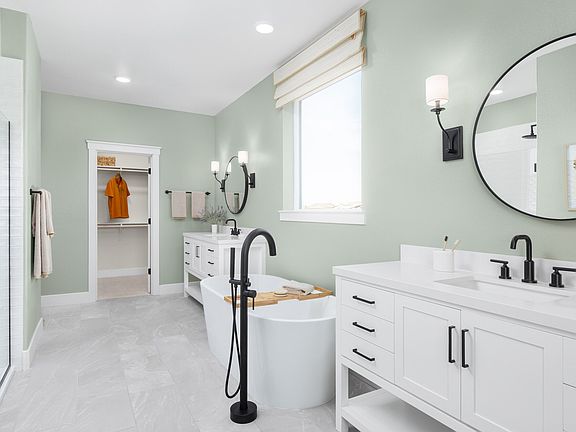 Primary bath with dual vanities and freestanding tub