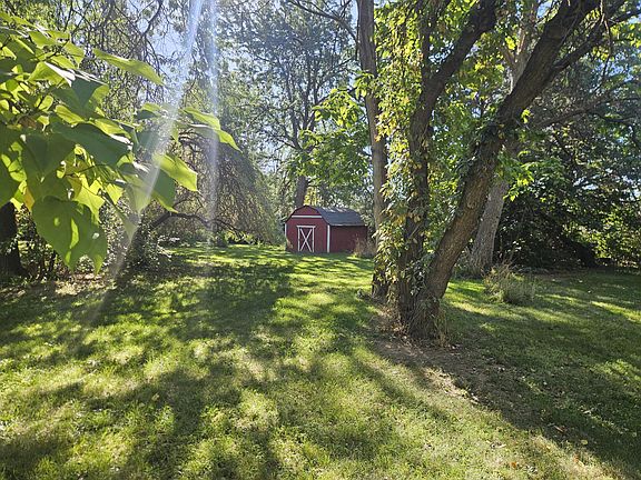 Back of property (backyard). You get to enjoy the scenery and privacy of this backyard. Barn not part of rental.