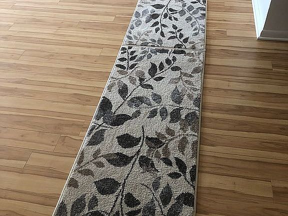 Laminated floor throughout