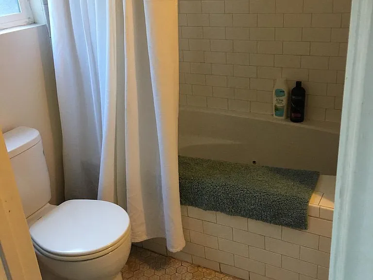 Studio's full bath