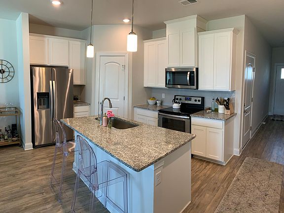 Spacious kitchen and first floor. 10_ ceilings!