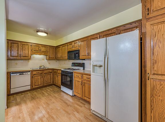 5th image of 1049 W Ogden Ave APT 306