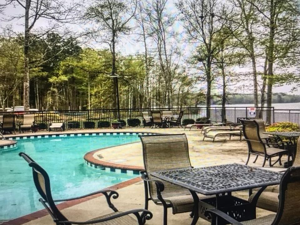 2nd Floor condo balcony looks onto this lake front community pool