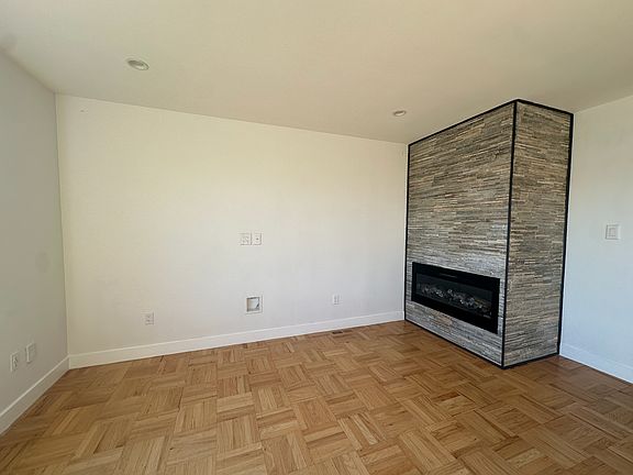 Living room with fireplace and TV Hookups