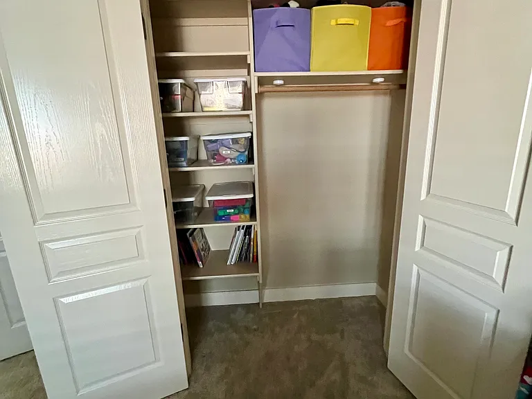Spacious closet with shelves in 2nd bedroom