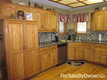 Kitchen
						:
						All stainless whirlpool, corian counter tops