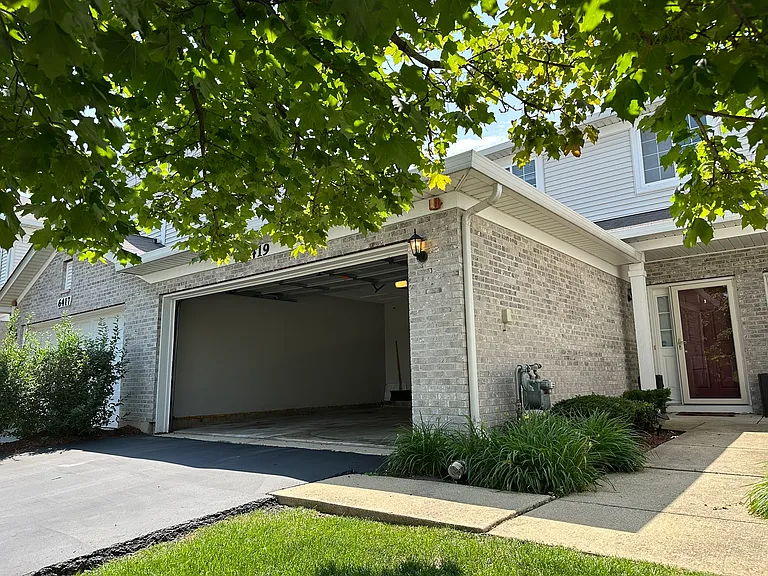 front door with 2 car garage