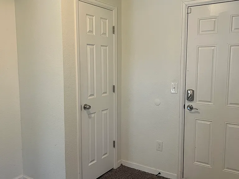 Bedroom #2 with door to backyard